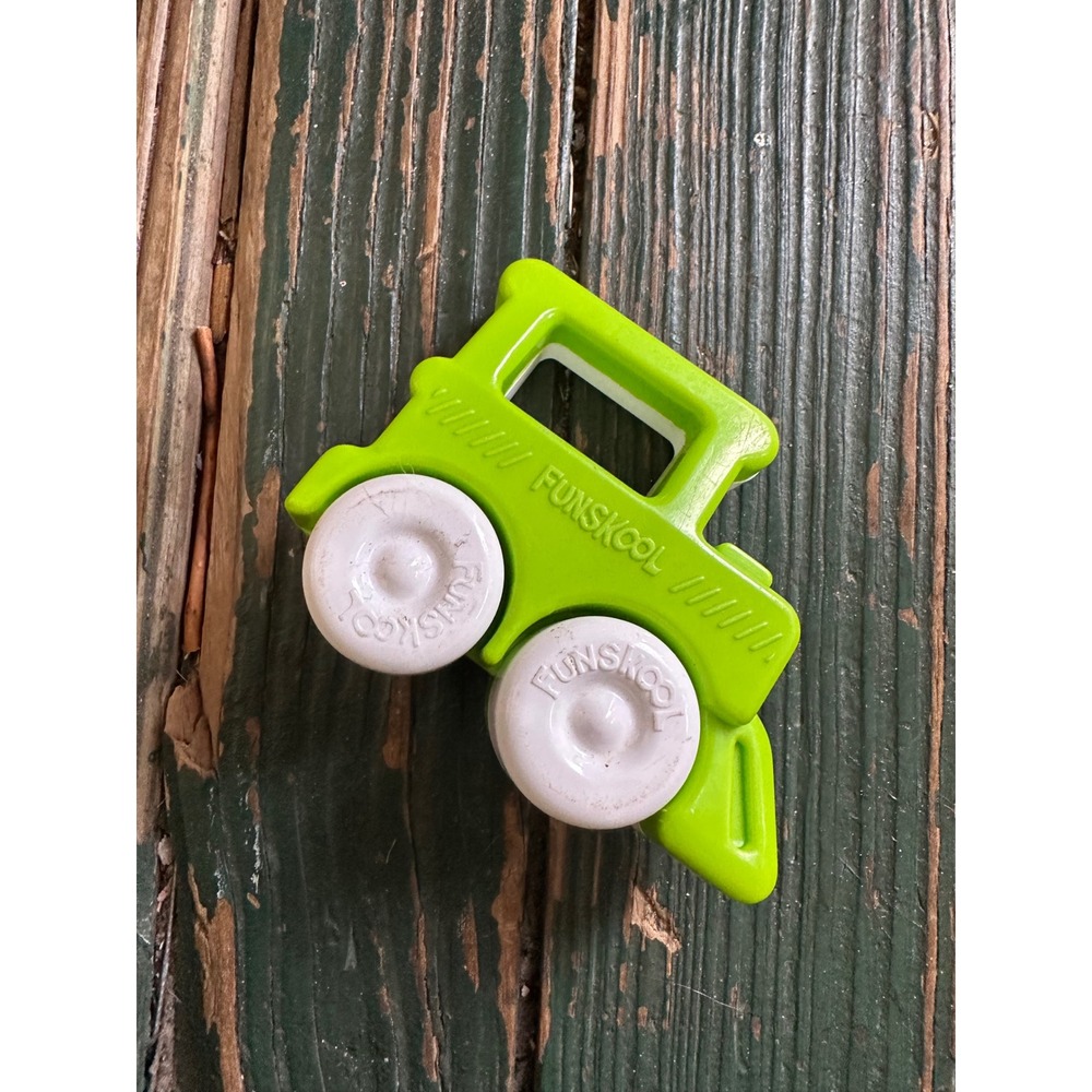Funskool Giggles Lime Green White Plastic Bulldozer Toy rattle for Toddlers